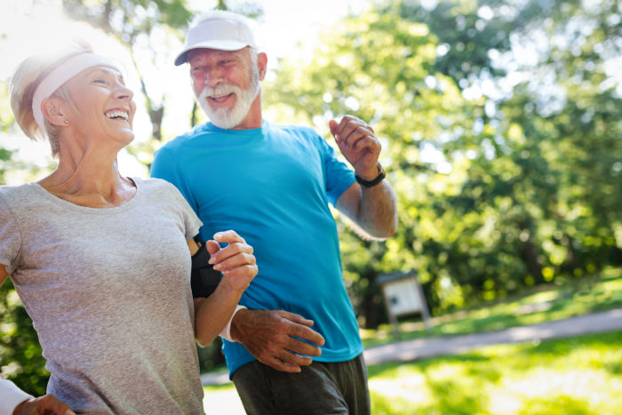 Elderly Modesto couple jogging