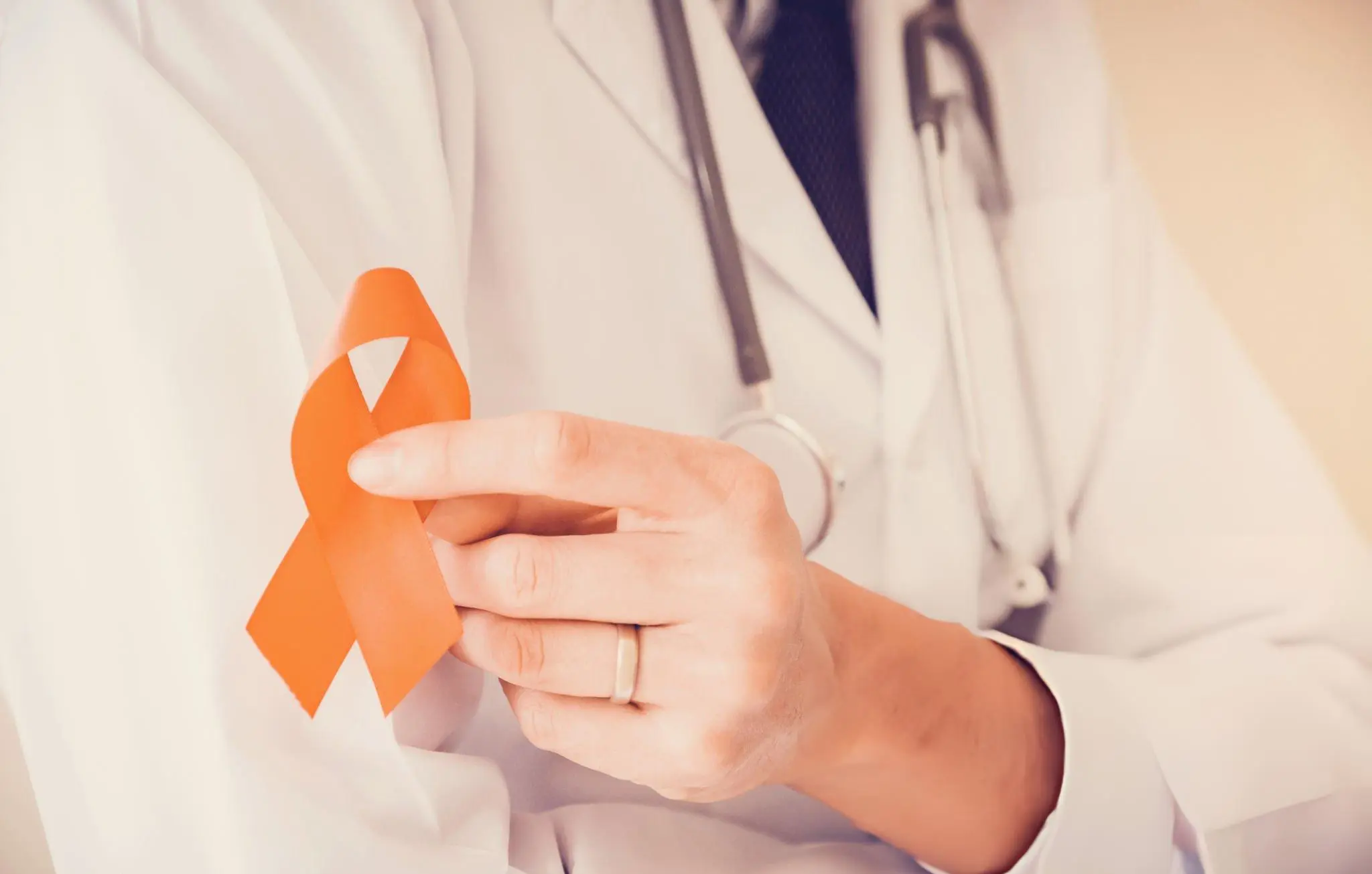 A healthcare professional preparing a syringe with precision in a clinical setting, symbolizing the careful administration of stem cell and exosome therapy for Multiple Sclerosis.