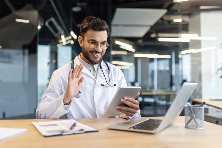 A healthcare provider offers ongoing support and education to a patient for long-term wellness.