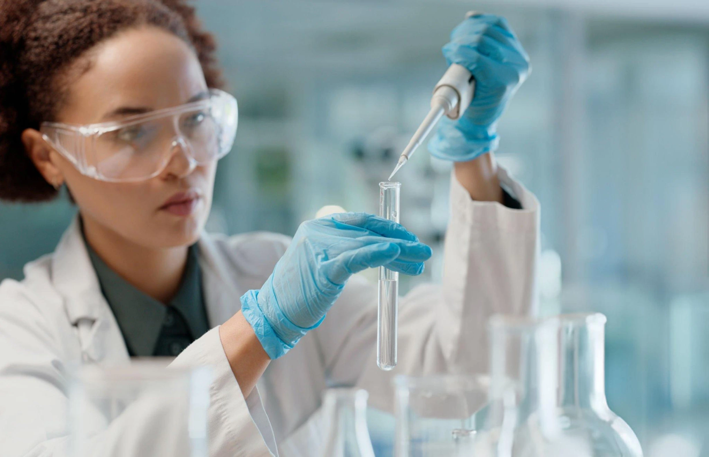 Scientist conducting precise lab work—representing the rigorous scientific foundation behind stem cell therapy offered in Norfolk