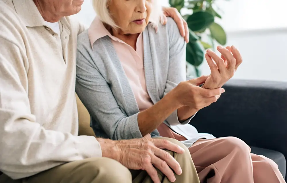 Older adults seated together—representing anti-aging stem cell therapy for joint support and mobility in Fayetteville