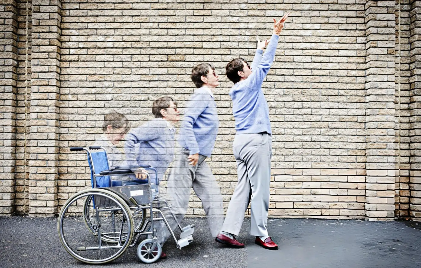 Time-lapse sequence showing a person transitioning out of a wheelchair to standing and reaching upwards, symbolizing functional recovery and mobility preservation through stem cell therapy.