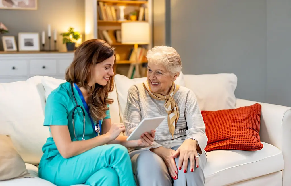 Medical professional consulting senior patient for stem cell therapy