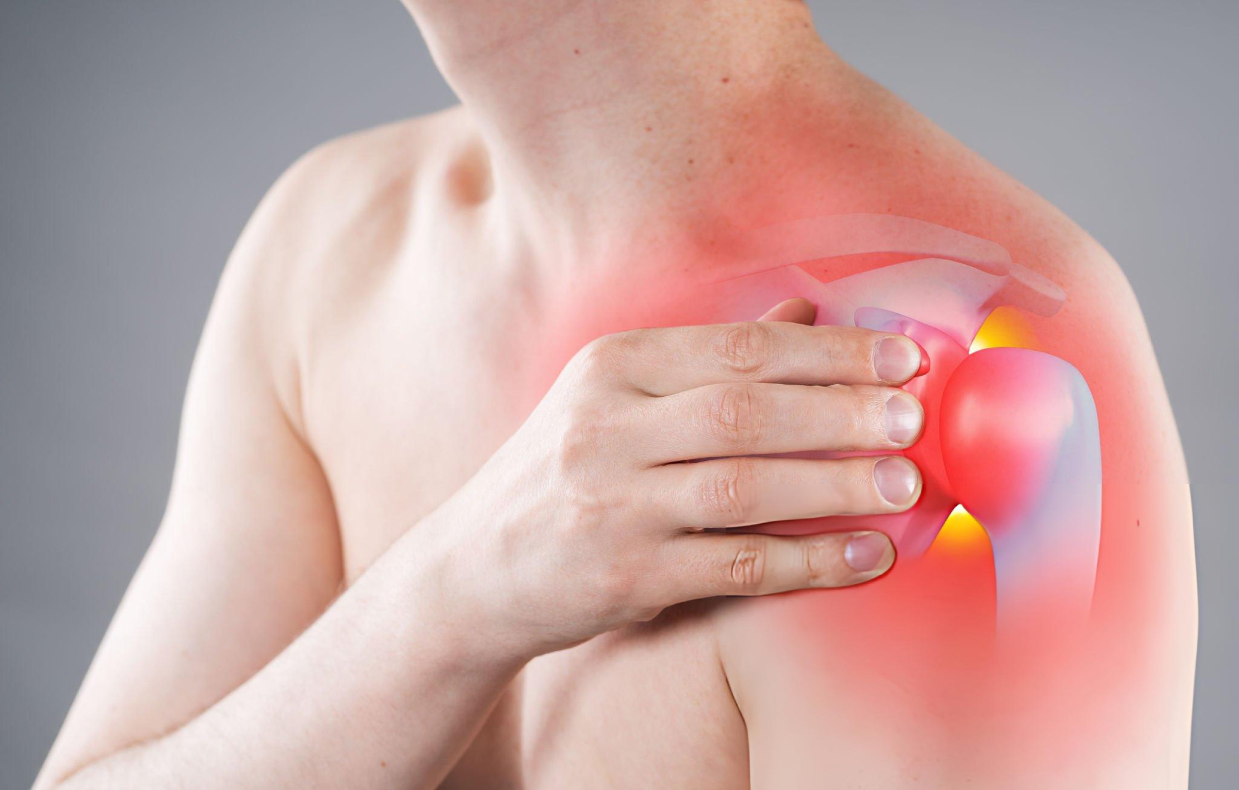 Person holding painful shoulder with highlighted joint inflammation